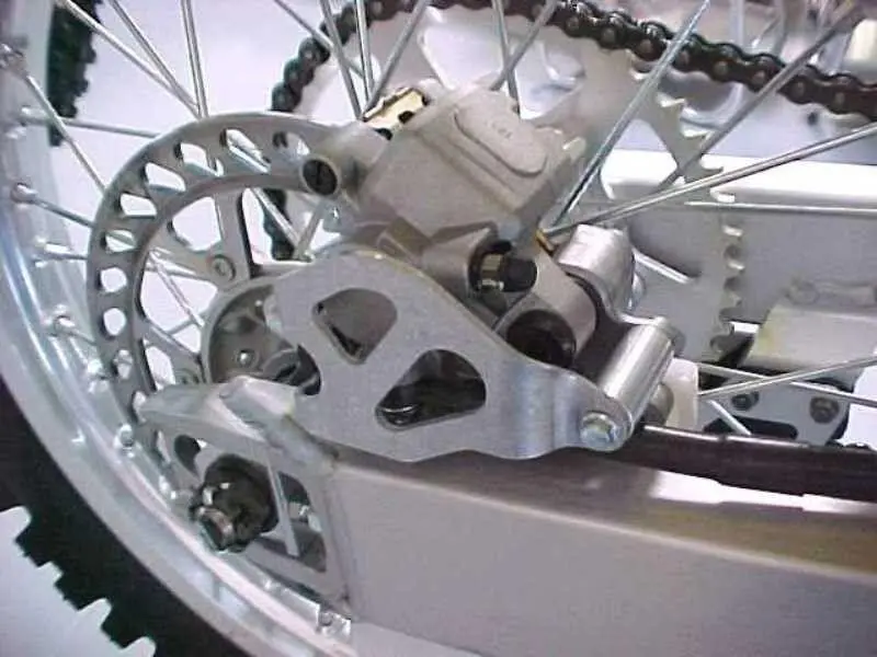 Works Connection - 25-015 - Aluminum Rear Brake Caliper Guard - Made In Usa 1